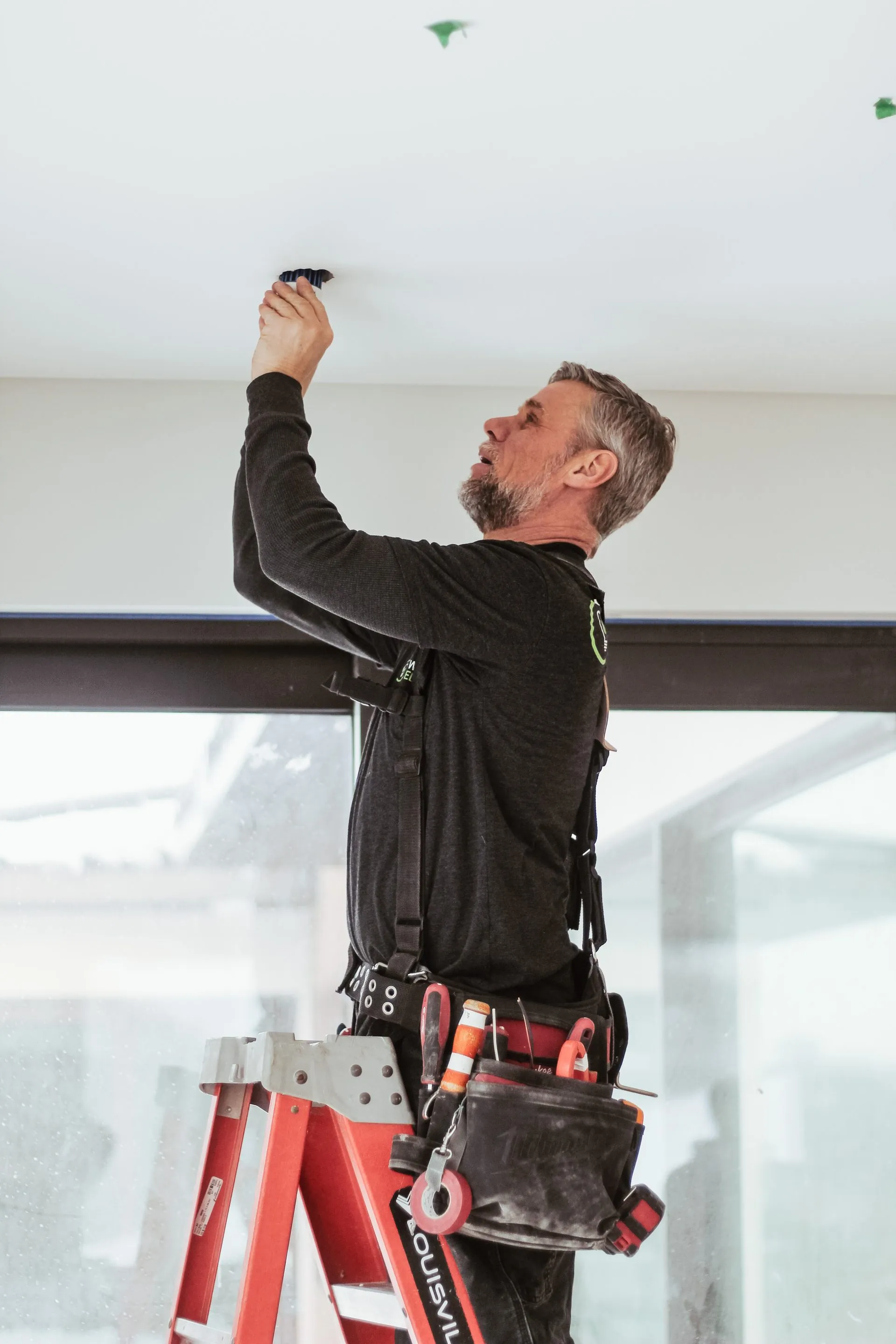 Wadden Electric project — Lutron Palladiom motorized shades in luxury dining room