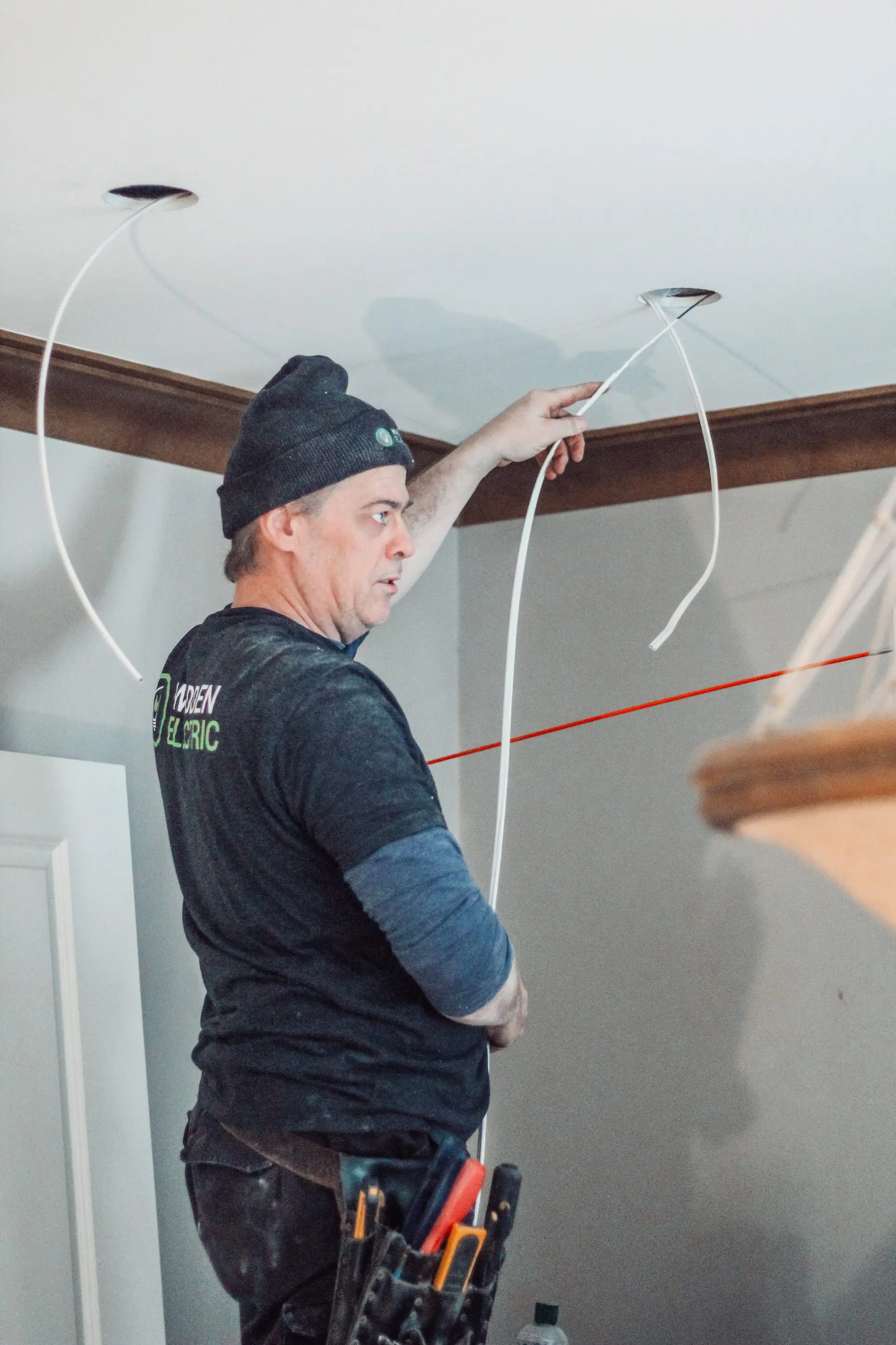 Wadden Electric project — motorized bedroom shades with morning light filtering through automated rollers